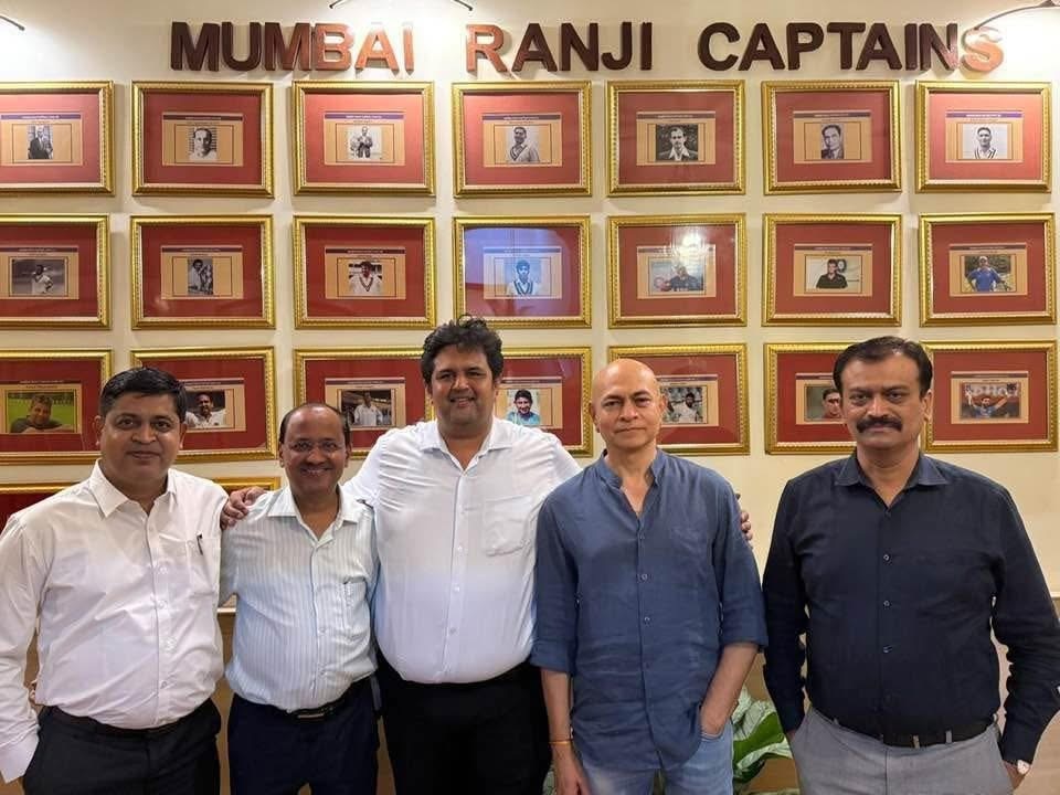 Adv. Harshad Bhadbhade with colleagues at a social gathering